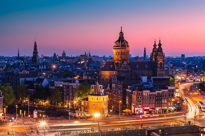 1-Hour Amsterdam Evening Canal Cruise - Landmarks Along the Canals: Centraal, Bridges, and the Anne Frank Question