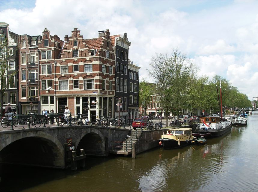 2.5-Hour Amsterdam Sightseeing Tour by Bike - Canal Intersections and the Wester Churchtower Moment