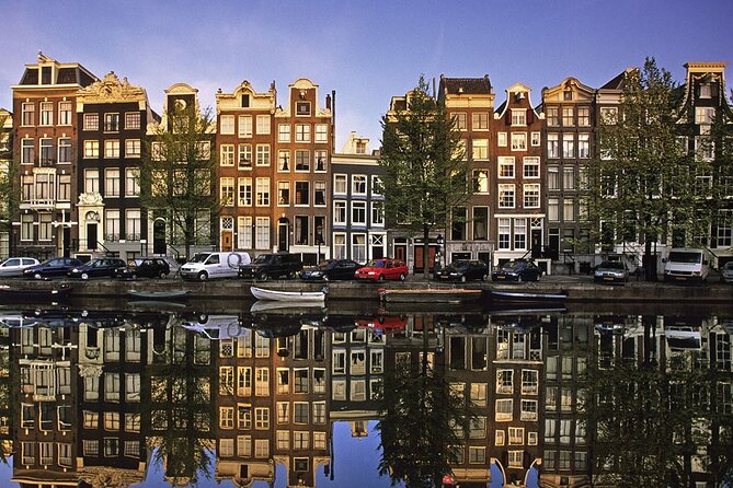 5 hrs Golden Age Amsterdam Private Walking Tour With Local Guide - Kleinste Huis, canals as a system, and the Waag’s guild-world