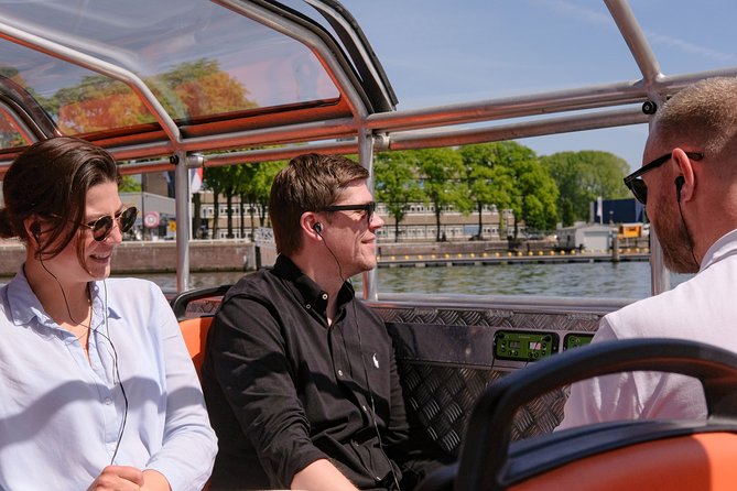 Amsterdam 1h Canal Cruise by Semi-Open Boat with Audio Guide - Anne Frank House and Heineken: When Big Names Float Past Your Window