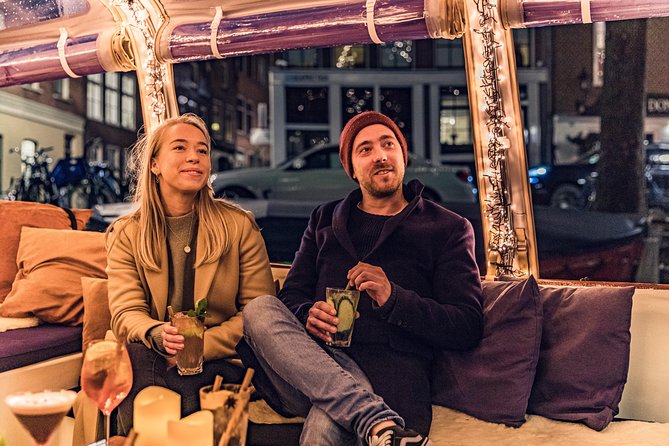 Amsterdam 2-Hour Evening Cruise With Live Guide and Bar - The most prestigious church and the Skinny Bridge moment