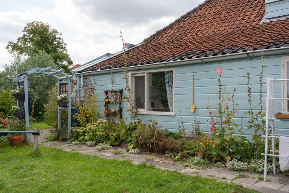 Amsterdam: 2-Hour Guided Canoe Trip - Two hours on the water: Watergang village, meadows, and wetlands stories