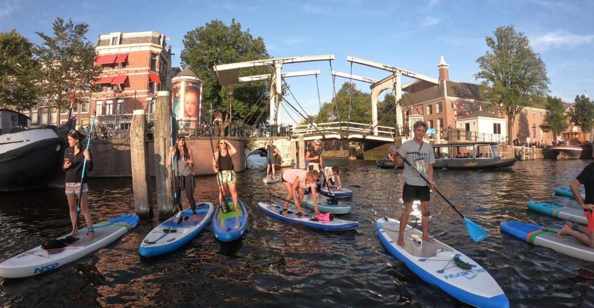 Amsterdam: 2-Hour Stand Up Paddle Board Tour - Amsterdam from the water: bridges, town houses, and museum passes