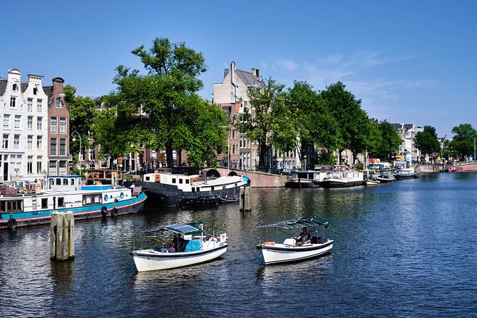 Amsterdam: 60-Minute Guided Private Canal Cruise with Drinks - Golden Bend on the Herengracht: grand facades at canal level