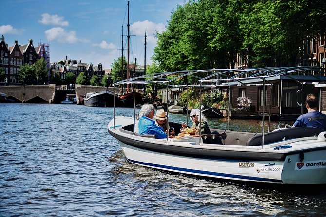 Amsterdam: 60-Minute Guided Private Canal Cruise with Drinks - Seven Bridges: the photo moment you’ll actually enjoy