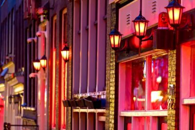 Amsterdam: After Dark Red Light District Tour - Meeting at Frisco Inn and the rules that shape the experience