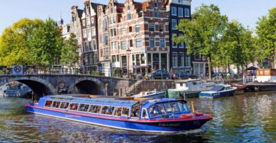 Amsterdam: Canal Cruise and Jewish Cultural Quarter Tickets - Matching Sights to Landmarks: Golden Bend, Music Building, and VOC Ship
