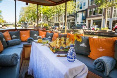 Amsterdam Canal Cruise in Classic Salon Boat With Drinks and Cheese - Price and Value: Why $40.84 Can Be a Good Deal for an Hour