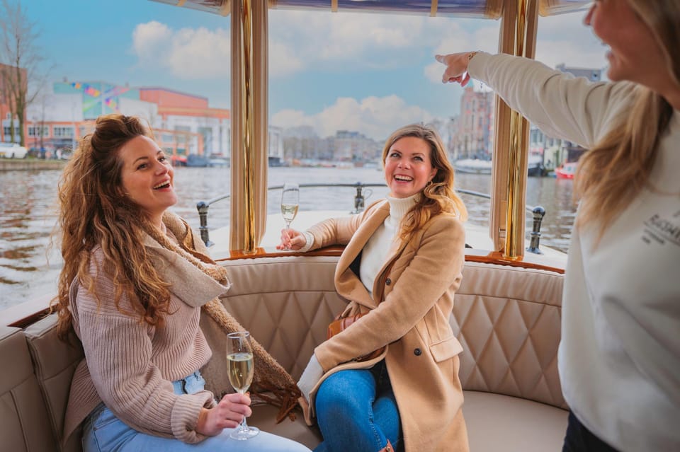 Amsterdam: Canal Cruise with Bubbles & Bites - Skipper + Live Guide: The Stories You’ll Actually Remember