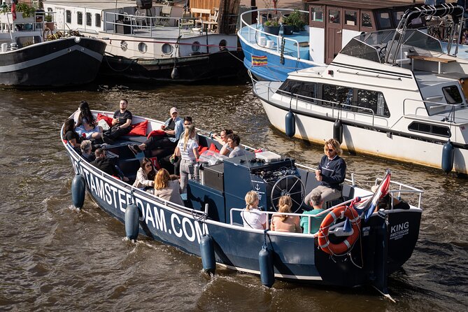 Amsterdam Canal Cruise with Live guide & Two drinks - Central St. - A 1-Hour Canal Cruise From Central St. That Saves Your Day