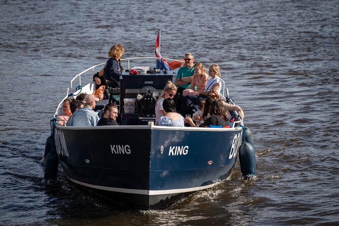 Amsterdam Canal Cruise with Live guide & Two drinks - Central St. - Small-Group Comfort Even When It Rains