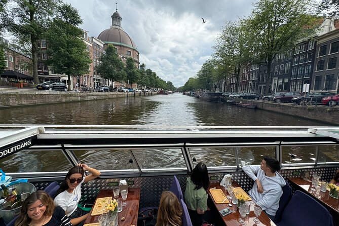Amsterdam Cheese and Wine Canal Cruise - Amstel Church, the Hermitage Museum, and a calmer canal-belt vibe