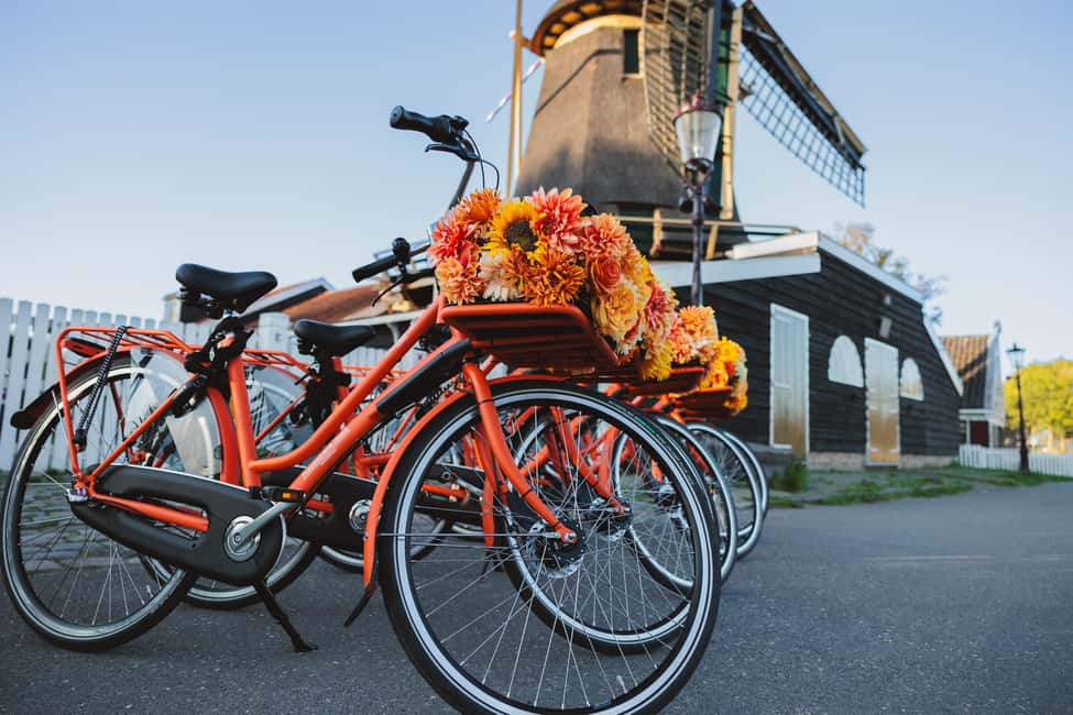 Amsterdam: Cheese, Windmill & Countryside Bike Tour - Cycling along Nieuwendammerdijk and into the Ransdorp village vibe