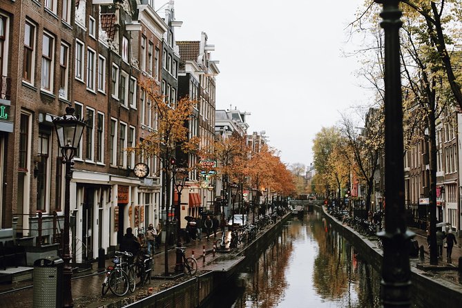 Amsterdam City Center Guided Walking Tour Semi-Private 12ppl Max - Why a semi-private, 2.5-hour loop makes Amsterdam click