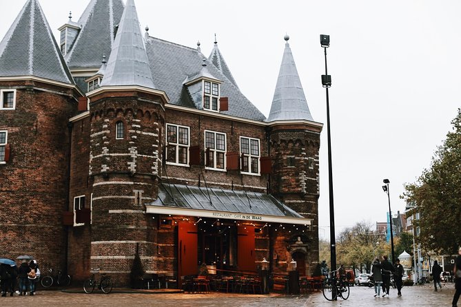 Amsterdam City Center Guided Walking Tour Semi-Private 12ppl Max - Begijnhof: the calm pocket that explains Amsterdam’s softer side