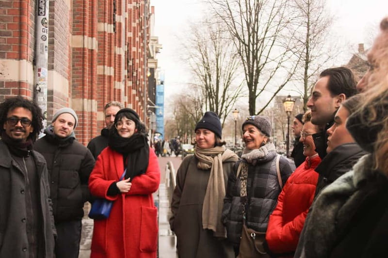 Amsterdam: City walking experience with a local - Finding your way: Beursplein to start strong