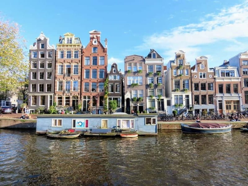 Amsterdam: City walking experience with a local - Spui Square: where city life shifts from monuments to everyday rhythm