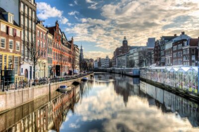 Amsterdam City walking tour - Two Hours of Amsterdam on Foot: Pacing, Cobblestones, and Canal Views