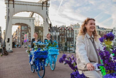 Amsterdam: Explore Canals, Guided Tour on Flower Bikes - Meeting point near Central Station: easy to find, easy to start
