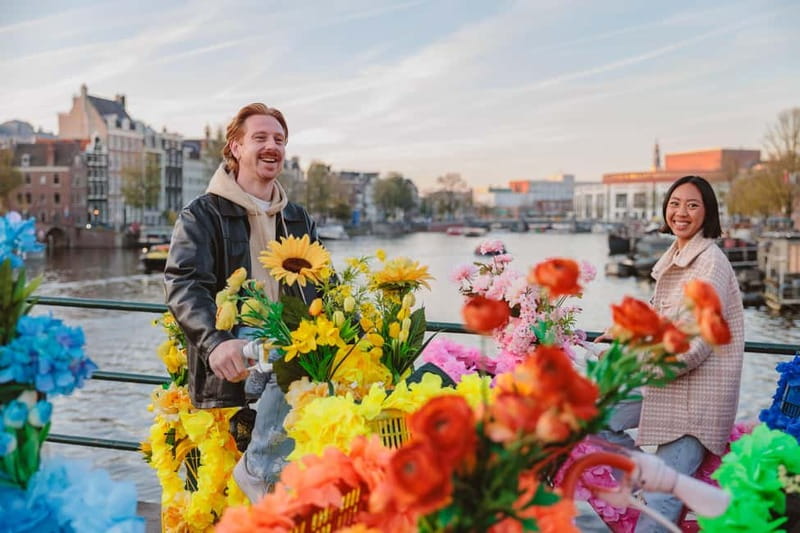 Amsterdam: Explore Canals, Guided Tour on Flower Bikes - Stop-by-stop: from Jordaan photo views to Dam Square monuments