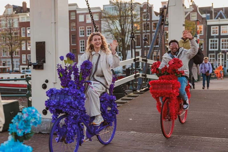 Amsterdam: Explore Canals, Guided Tour on Flower Bikes - The guides: when humor and answers are part of the package