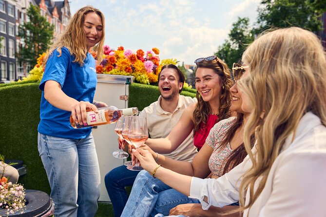 Amsterdam Flower Boat Canal Cruise with Local Guide - The Amsterdam Canal Ring: Golden Bend and the idea of width