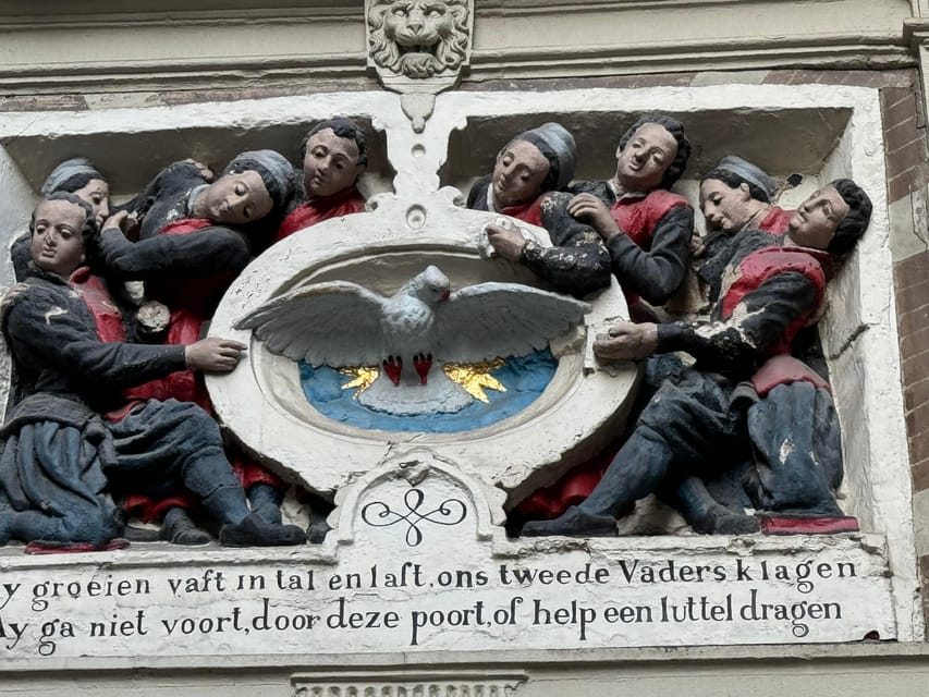 Amsterdam: Ghost Walking Tour and Dark History - Oudezijds Achterburgwal and Prins Hendrikkade: canal stories with teeth