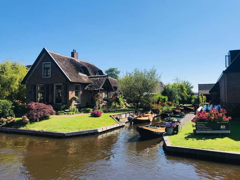 Amsterdam: Giethoorn, Afsluitdijk and Zaanse Schans Day Trip - Afsluitdijk: the dam-and-dyke moment with real photo payoff
