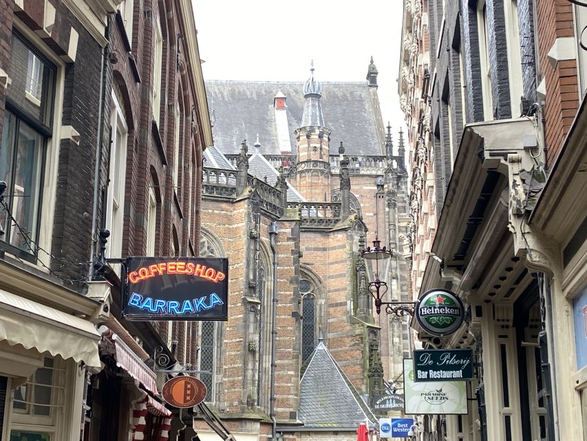Amsterdam: Guided Off-The-Beaten-Track Walking Tour - Starting at Beursplein: how the walk threads classic Amsterdam with quieter streets