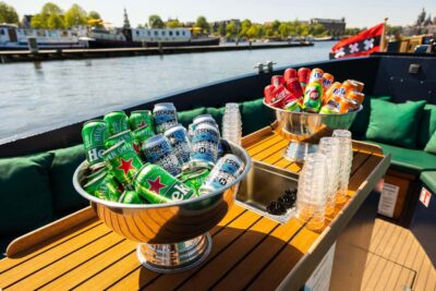 Amsterdam: Guided Open Boat Canal Cruise Including Drink - Electric open-boat comfort: breeze, but with a plan