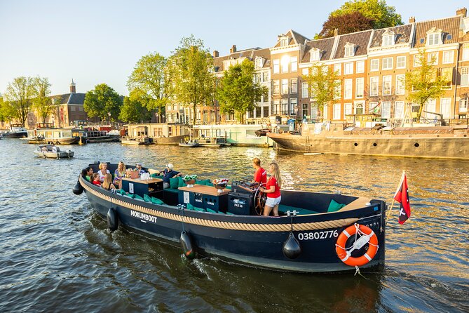 Amsterdam: Guided Open Boat Canal Cruise Unlimited Drinks Option - Markets, canal houses, and the bridges you’ll remember