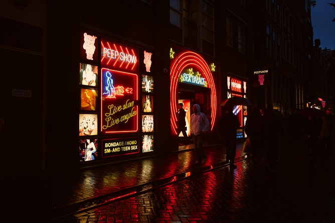 Amsterdam: Guided Red Light District and City Walking Tour - Entering The Red Light District from a streets-and-stories angle