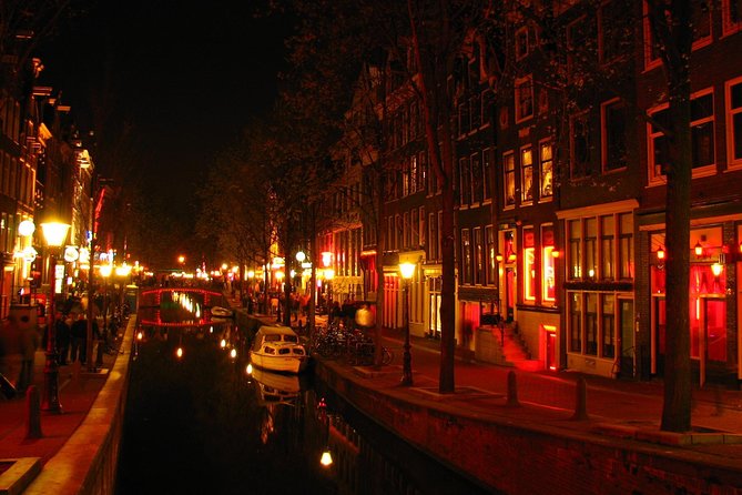 Amsterdam: Guided Red Light District and City Walking Tour - Old Town context: why the streets feel older here