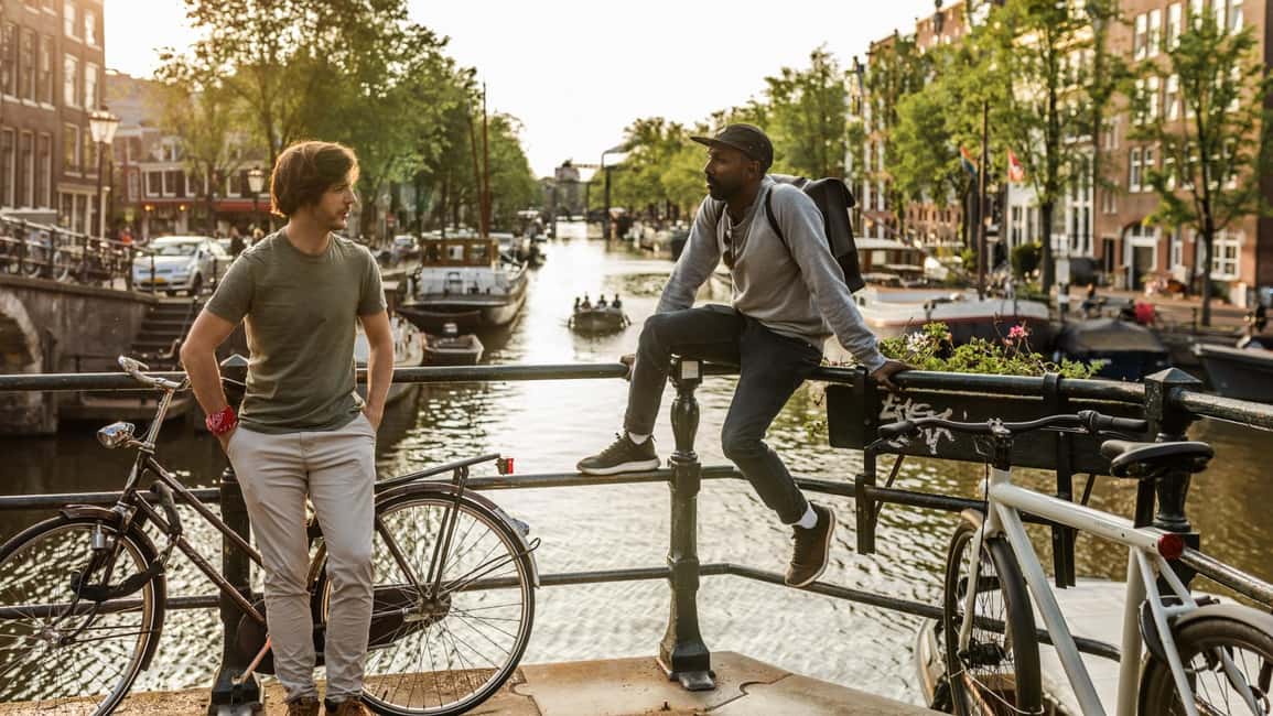 Amsterdam: Highlights & Hidden Gems Private Walking Tour - Dam Square, Westerkerk, and landmarks with context