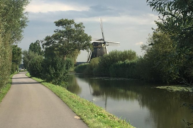 Amsterdam in a Nutshell 4 Hour Private Car Tour and Amsterdam Born Private Guide - Price and value: $458.56 for up to 4