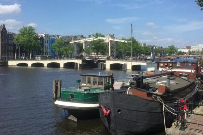Amsterdam in a Nutshell 4 Hour Private Car Tour and Amsterdam Born Private Guide - Pickup, start time, and mobile tickets (why morning matters)