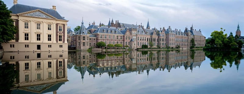 Amsterdam: Kinderdijk, Euromast, Delft and Den Haag Day Tour - Guide Energy Makes or Breaks a Day Like This