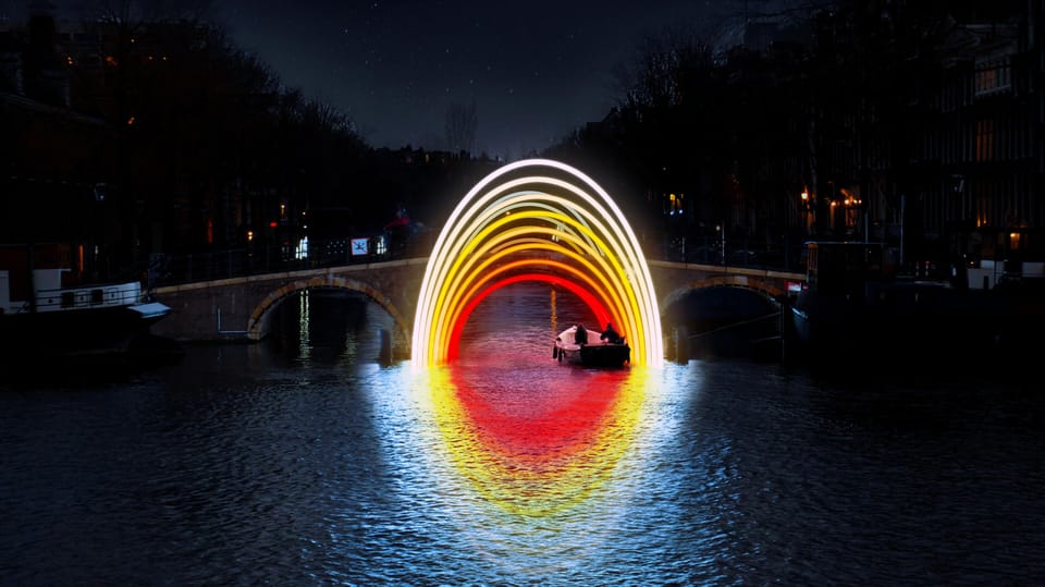 Amsterdam: Light Festival Boat Tour with Warm Drinks - Boarding KINboat: The Open-Boat Feeling in Amsterdam Winter