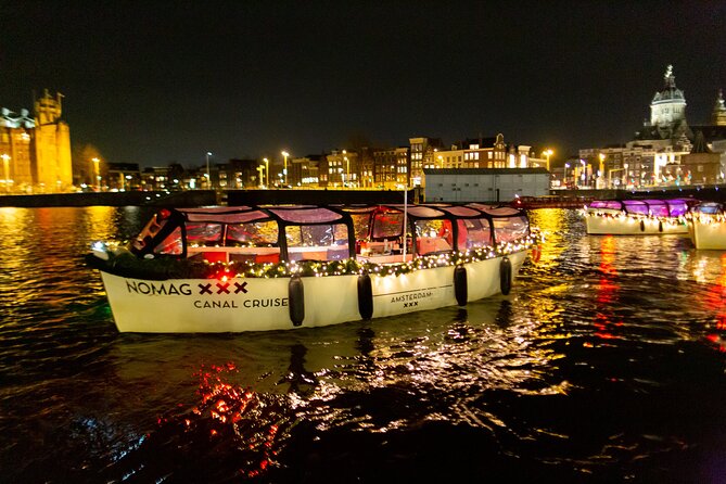 Amsterdam Light Festival: Canal Cruise + Snack & Unlimited Drinks - Boat comfort and visibility: covered, but plan for weather realities