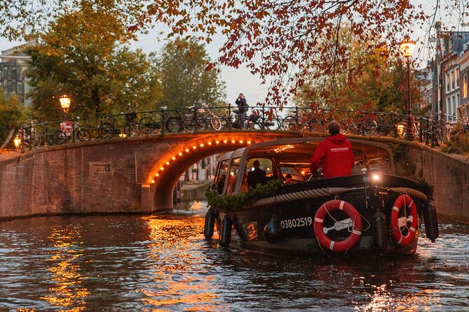 Amsterdam: Light Festival Open Boat - Unl. Drinks Option - Maritime History in a Former Navy Storage Facility