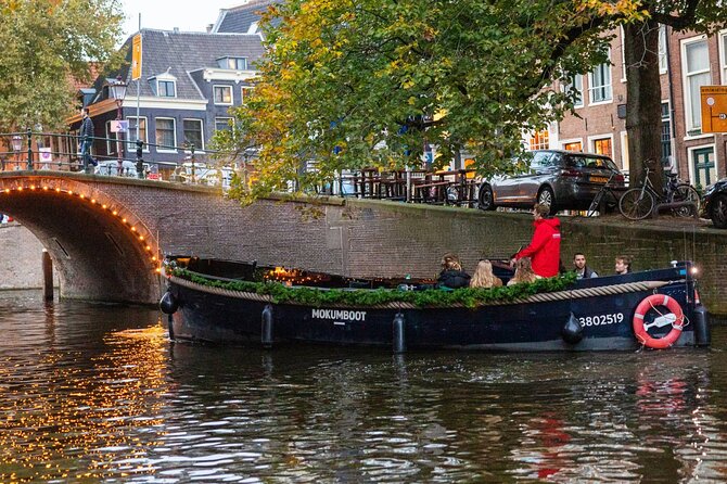 Amsterdam: Light Festival Open Boat - Unl. Drinks Option - Drinks, Blankets, Ponchos, and Night Comfort