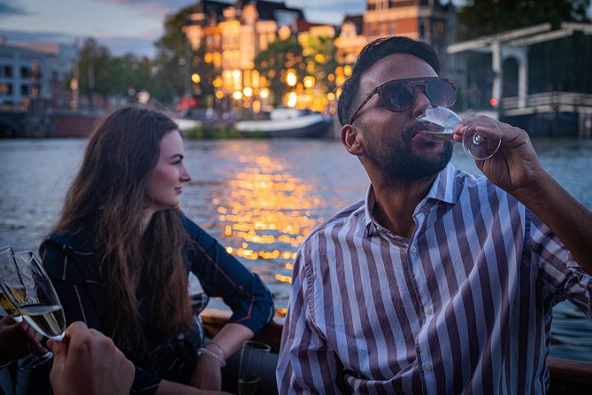 Amsterdam Light Festival Private Cruise With Welcome Drink - Amstel River: wider water for bigger light sculptures