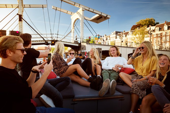 Amsterdam Light Festival: Saloon Boat Cruise + Hot Drinks & Bite - Starting Near the National Maritime Museum, Then Into the Light-Festival Route