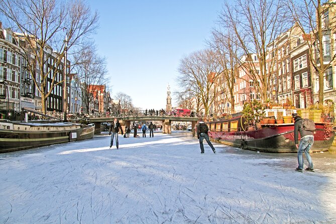 Amsterdam Light Festival Winter Walk with Stroopwafel Workshop - Begijnhof and Spui: A Pause in the Middle of Winter Footsteps