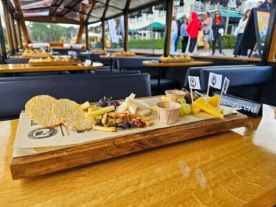 Amsterdam: Live GuideD Giethoorn Boat Tour & Cheese Platter - From Central Amsterdam to Giethoorn: The Coach Ride and First Timing Clues
