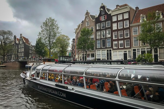 Amsterdam Live Guided Sightseeing Canal Cruise - Timing tips: when to book for the best atmosphere