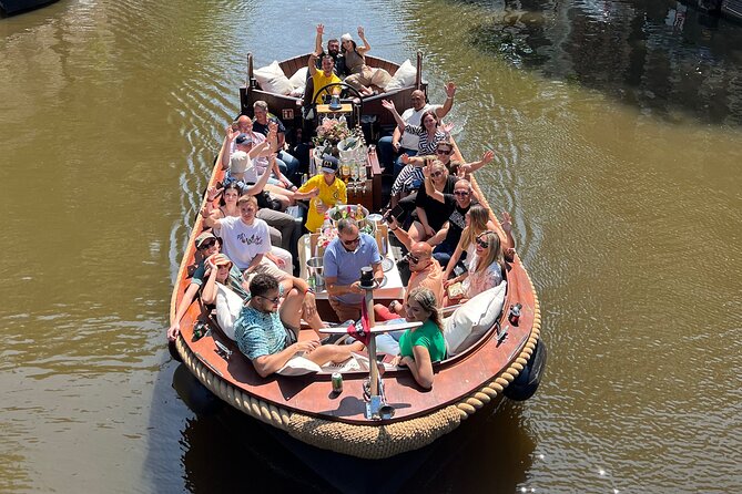 Amsterdam Luxury Boutique Boat tour with Unlimited Beer and Wine - The Route: De Wallen, Rembrandt’s House, Oude Kerk, and Magere Brug