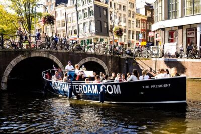 Amsterdam Open Boat Cruise in Old City Centre with Drinks Options - What You See: Amstel, UNESCO Canals, and the Red Light District