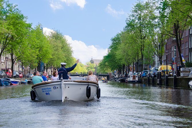 Amsterdam Open Boat Sightseeing Canal Cruise - Open-top canal views in a 75-minute loop