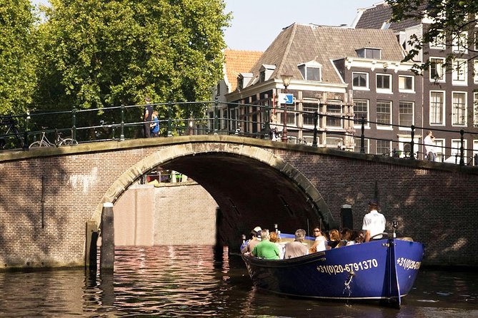 Amsterdam Open Boat Sightseeing Canal Cruise - Rijksmuseum, Centraal station, and the bridge between eras